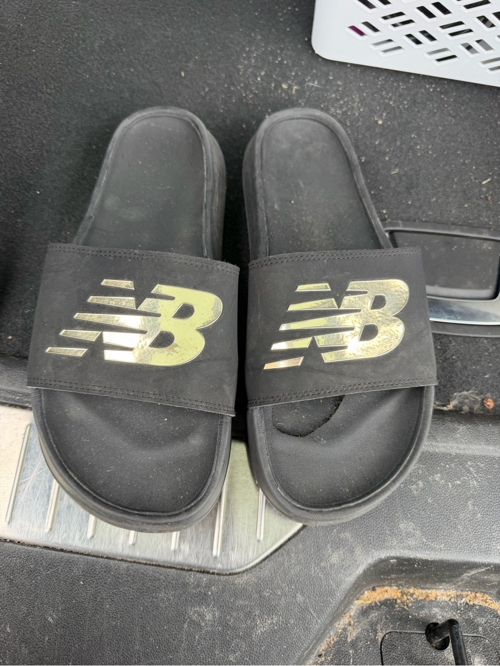 New Balance Black Slides with Metallic Gold Logo